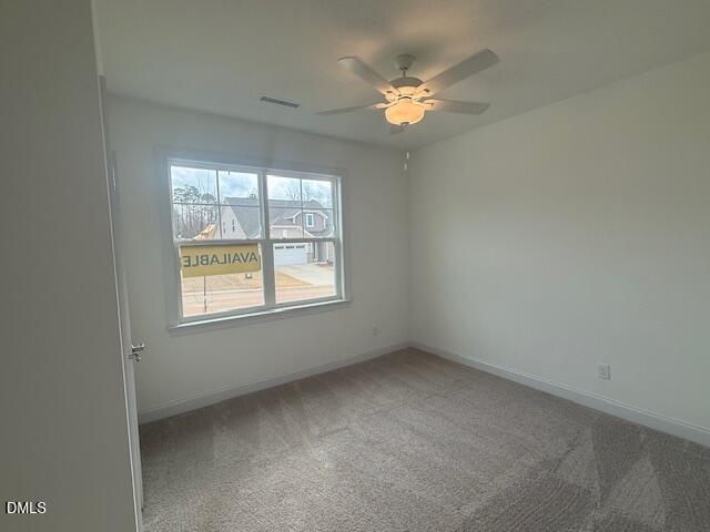 25 Slippery Elm Road Youngsville, NC 27596 - Photo 4 of 36 an empty room with a window