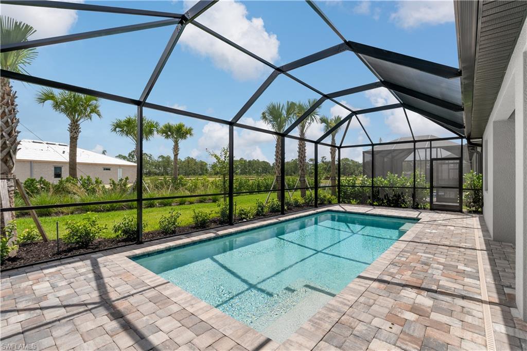 2104 Freemont Way Naples, FL 34119 - Photo 9 of 27 large outdoor pool