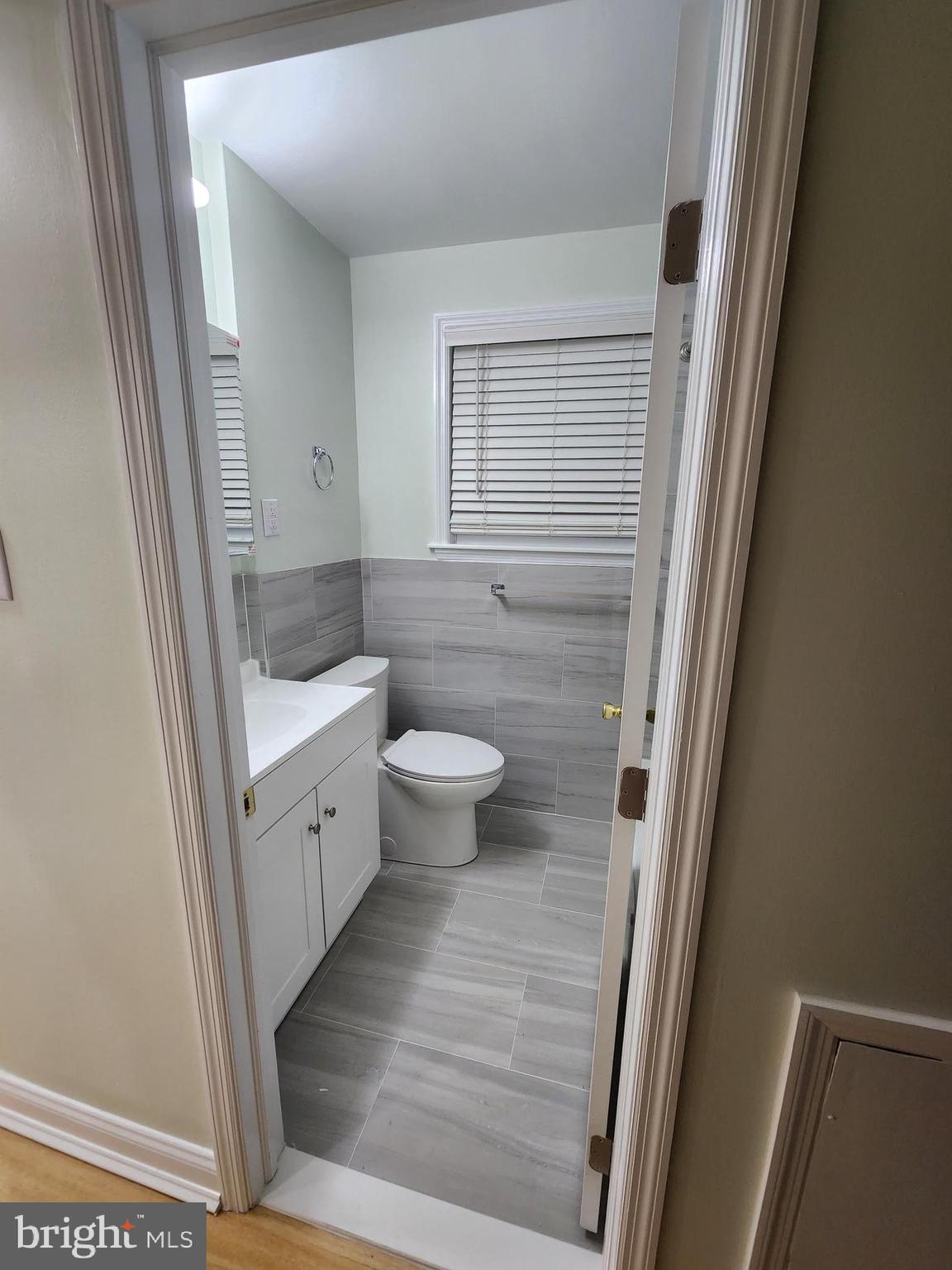 8303 Ridgeway Street Philadelphia, PA 19111 - Photo 18 of 24 a bathroom with a sink and a mirror