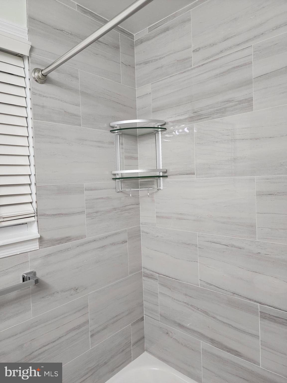 8303 Ridgeway Street Philadelphia, PA 19111 - Photo 19 of 24 a bathroom with a shower