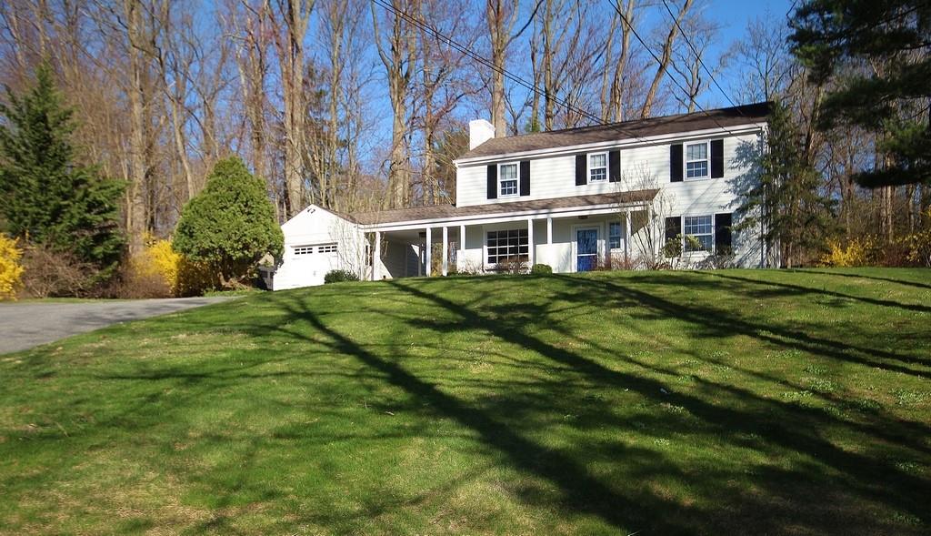 a view of a house with a big yard