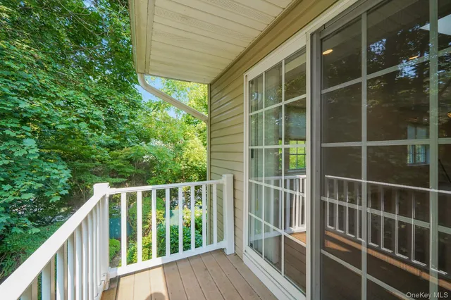 a front view of house with yard and outdoor seating