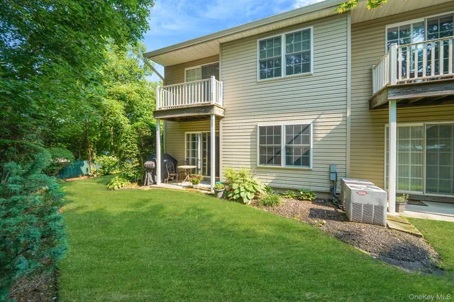 a view of a swimming pool and a yard