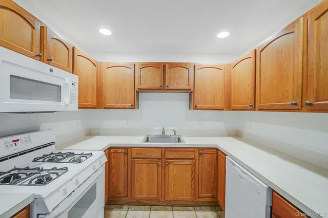 a view of a kitchen with a sink