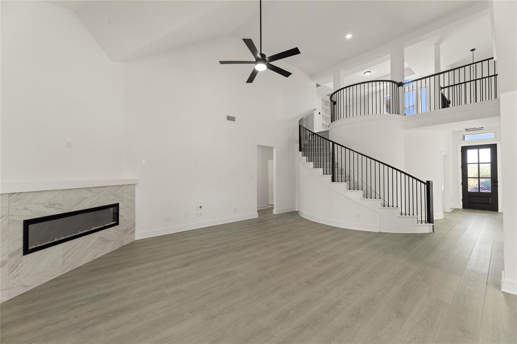 968 Gold Finch Lane Forney, TX 75126 - Photo 5 of 27 a view of an entryway with wooden floor