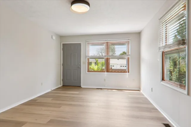 an empty room with windows