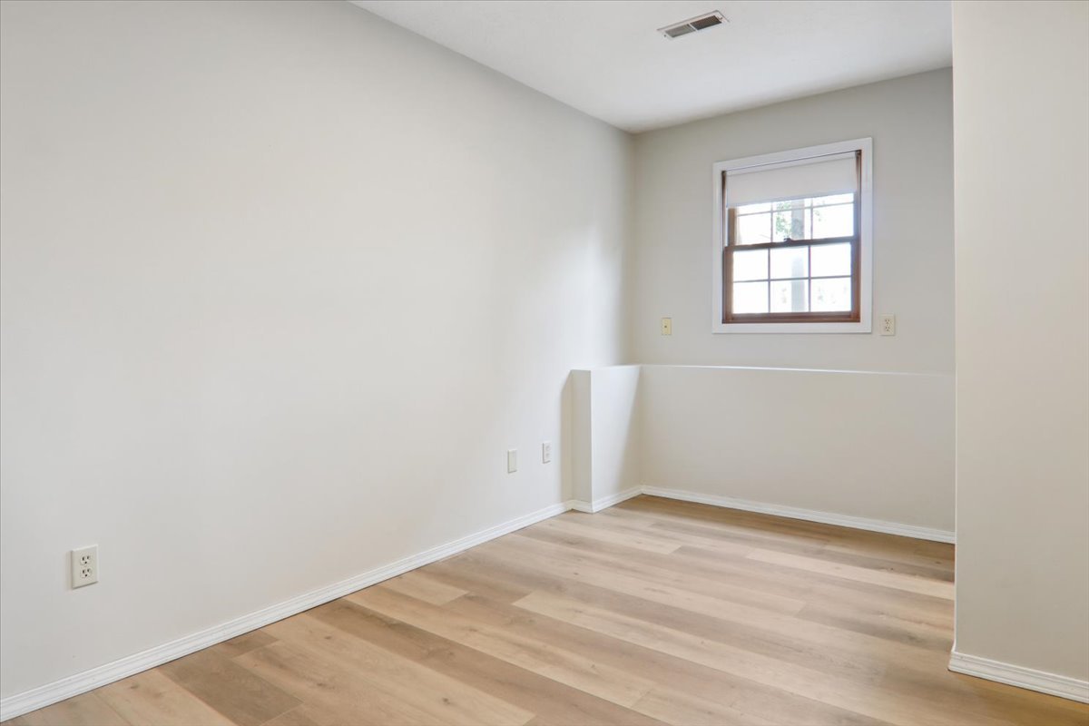 600 Carriage Hills Road, Unit A Normal, IL 61761 - Photo 8 of 19 an empty room with a window