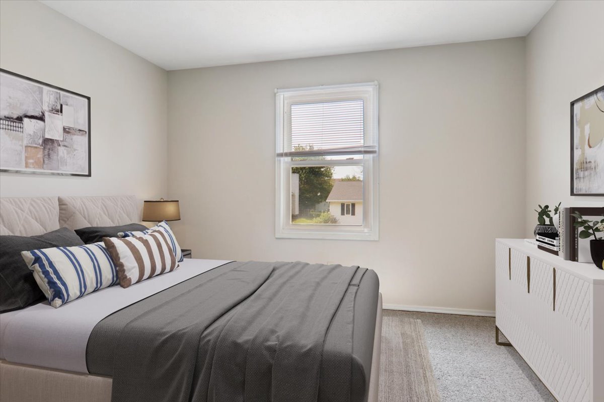 600 Carriage Hills Road, Unit A Normal, IL 61761 - Photo 10 of 19 a bedroom with a bed and a window