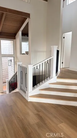 a view of a hallway with staircase