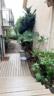 a view of backyard with green space