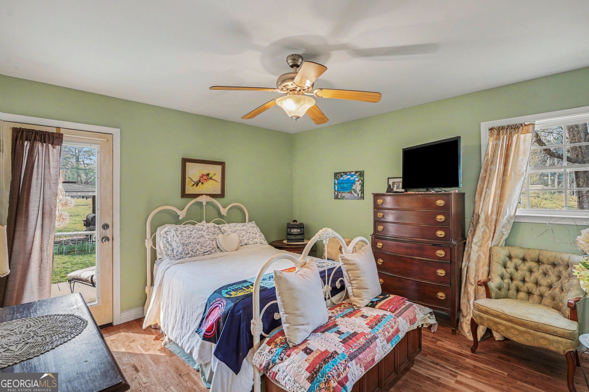 117 Dobbins Mill Road Griffin, GA 30223 - Photo 14 of 27 a bedroom with a bed and furniture