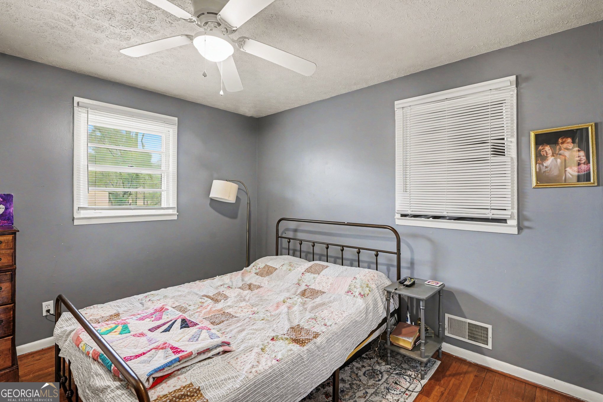 117 Dobbins Mill Road Griffin, GA 30223 - Photo 22 of 27 a bedroom with a bed a window and closet