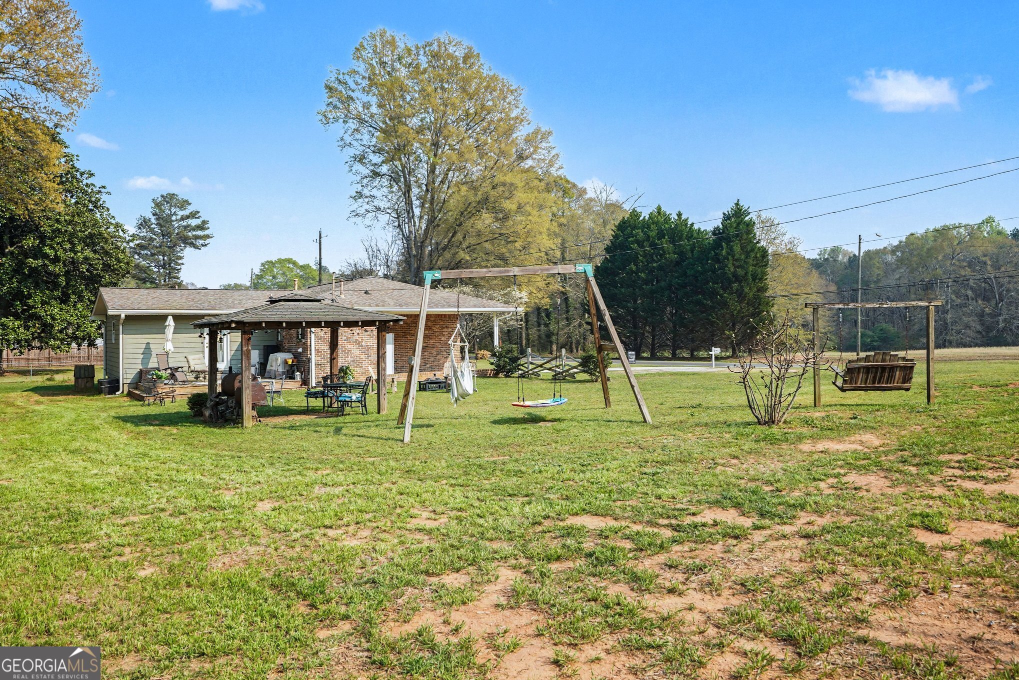 117 Dobbins Mill Road Griffin, GA 30223 - Photo 25 of 27 a view of a house with backyard