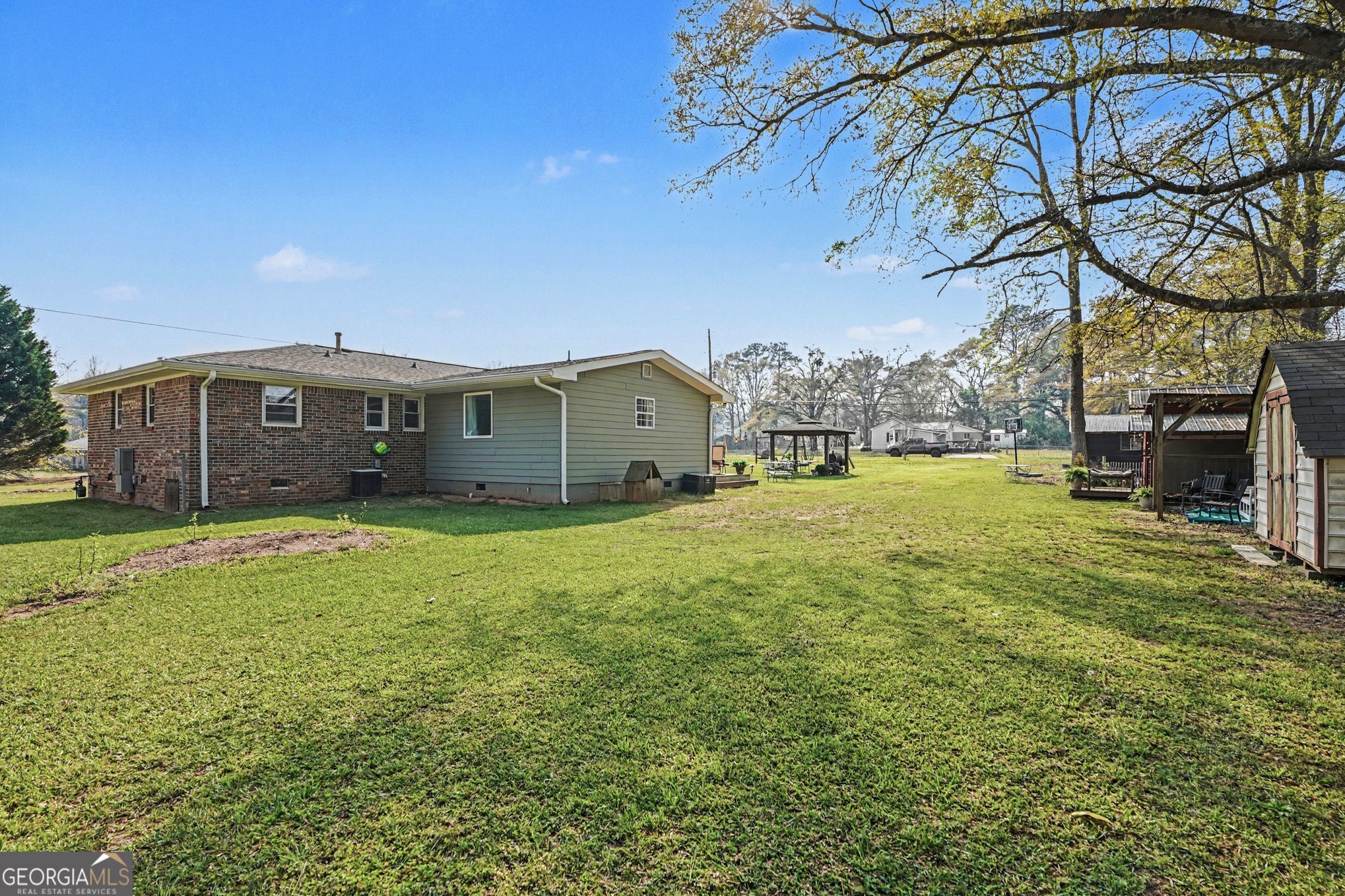 117 Dobbins Mill Road Griffin, GA 30223 - Photo 27 of 27 a view of a house with a big yard