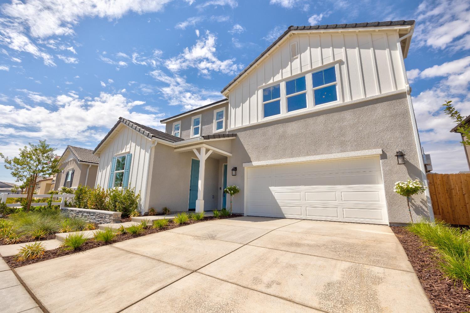 1179 Maclure Avenue Madera, CA 93636 - Photo 2 of 36 a front view of a house with yard