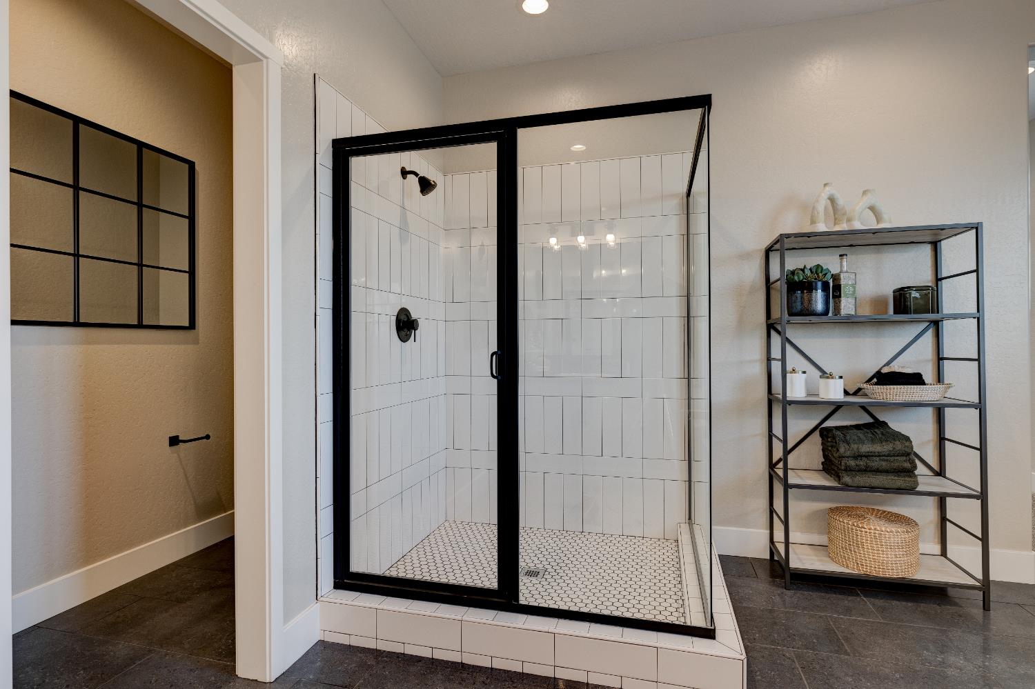 1179 Maclure Avenue Madera, CA 93636 - Photo 26 of 36 a bathroom with a glass door shower and a sink
