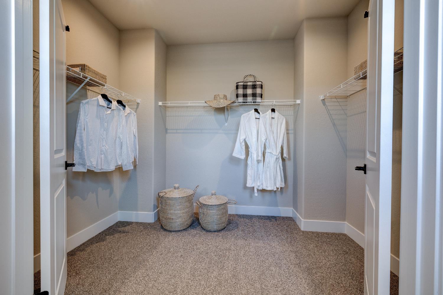 1179 Maclure Avenue Madera, CA 93636 - Photo 31 of 36 a view of walk in closet and bathroom