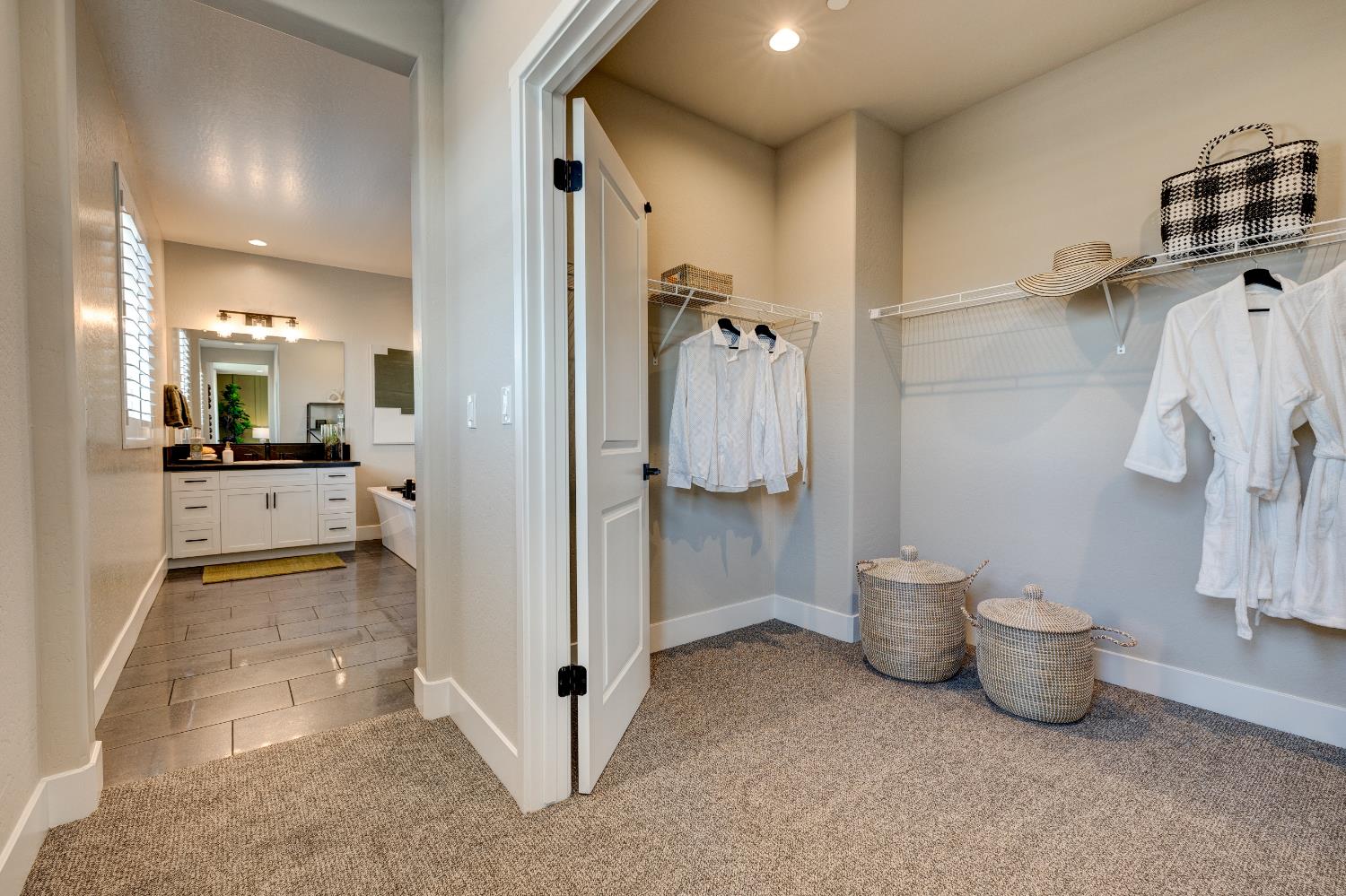 1179 Maclure Avenue Madera, CA 93636 - Photo 32 of 36 a view of a walk in closet and bathroom