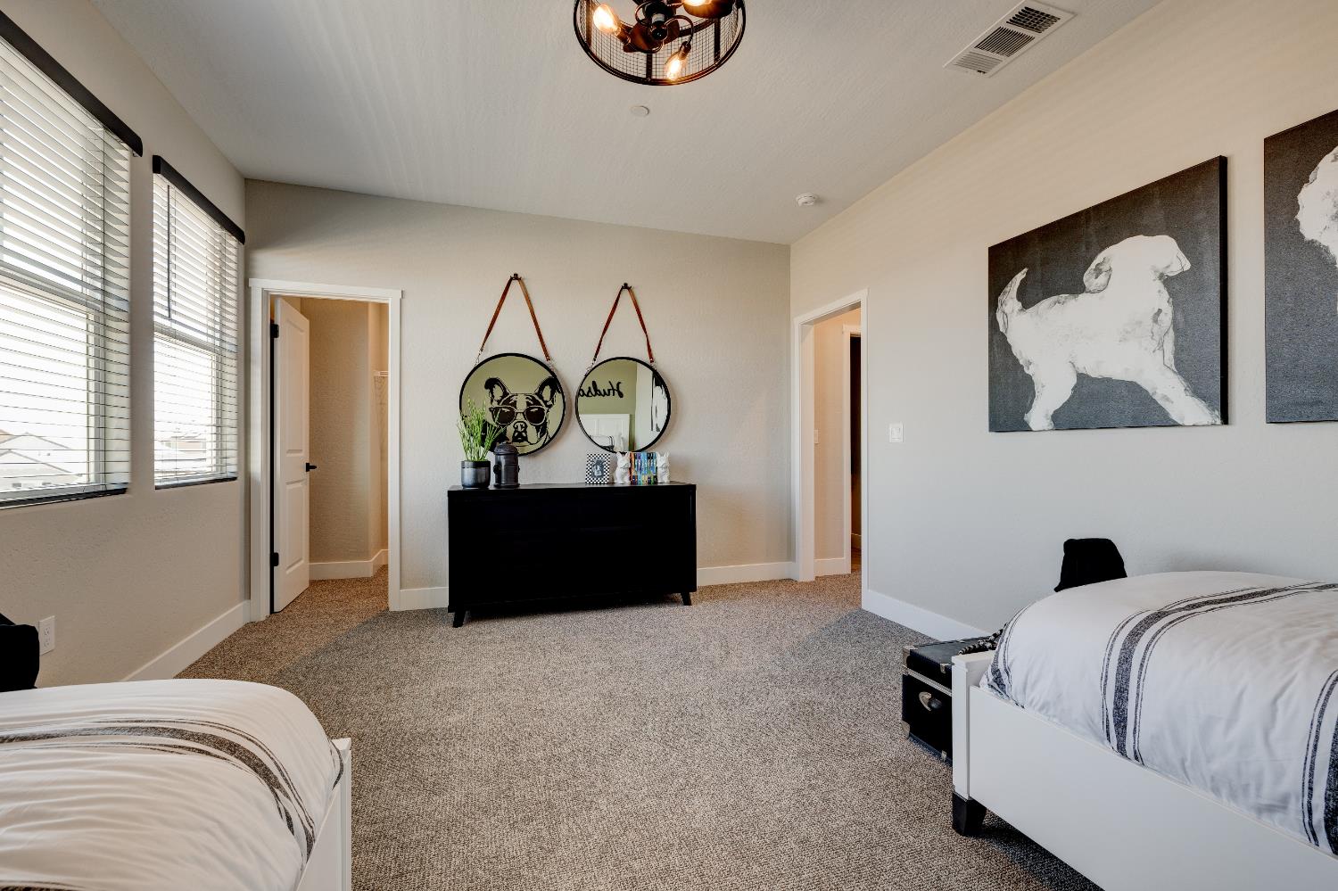 1179 Maclure Avenue Madera, CA 93636 - Photo 34 of 36 a bedroom with a bed and a dresser