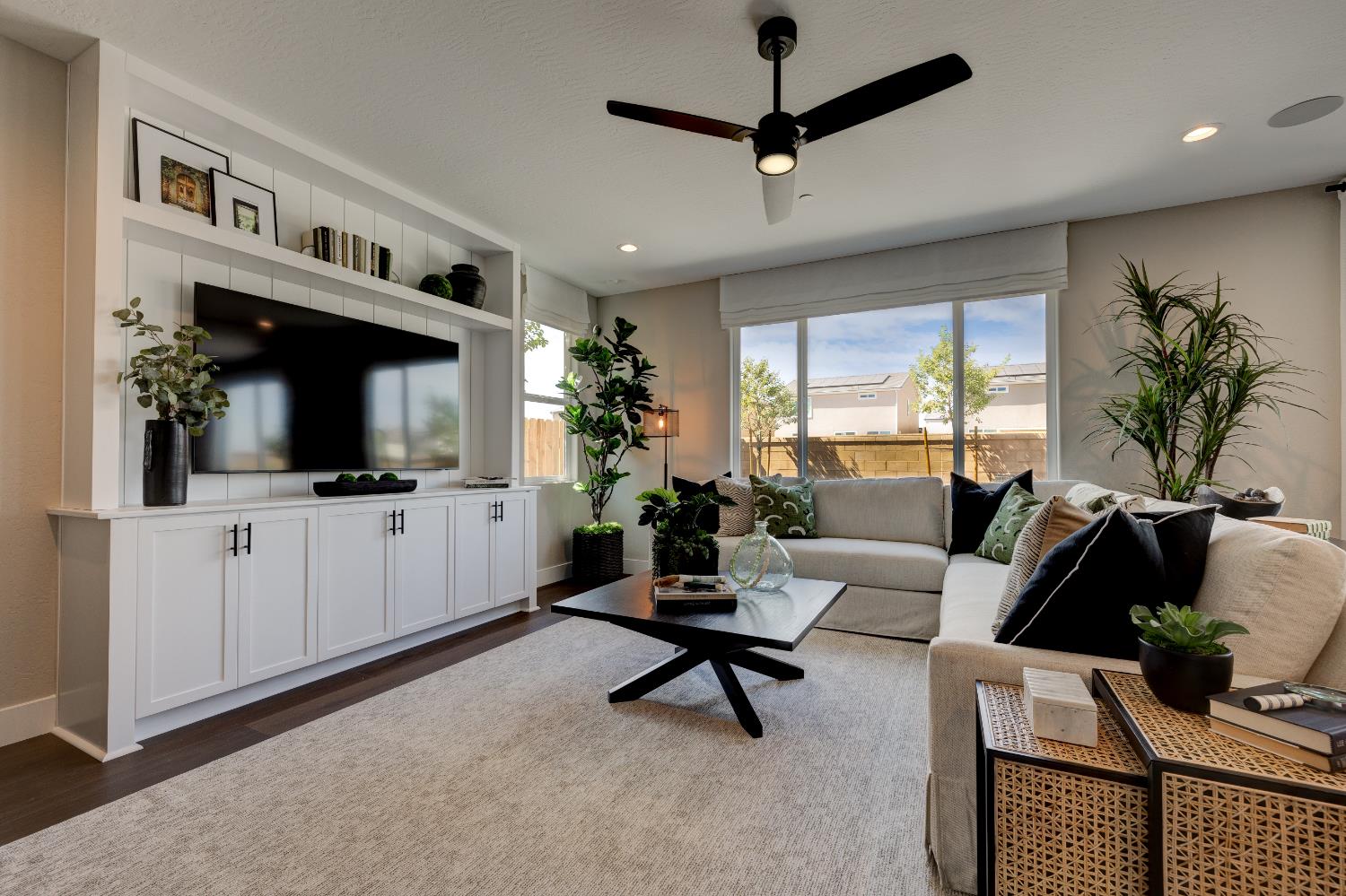 1179 Maclure Avenue Madera, CA 93636 - Photo 9 of 36 a living room with furniture and a flat screen tv