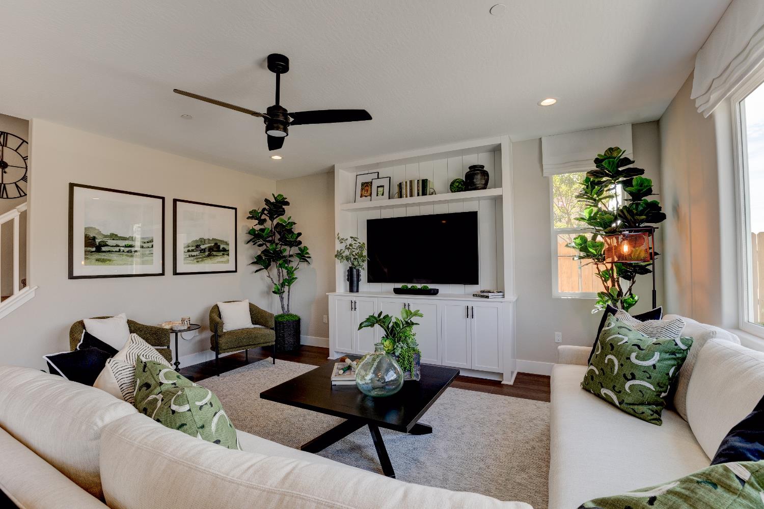 1179 Maclure Avenue Madera, CA 93636 - Photo 10 of 36 a living room with furniture and a flat screen tv