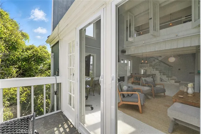 a view of a living room and a window