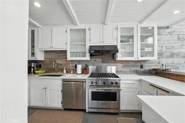 a bedroom with a large bed and a large window