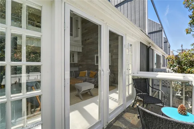 a bathroom with a sink mirror and a toilet