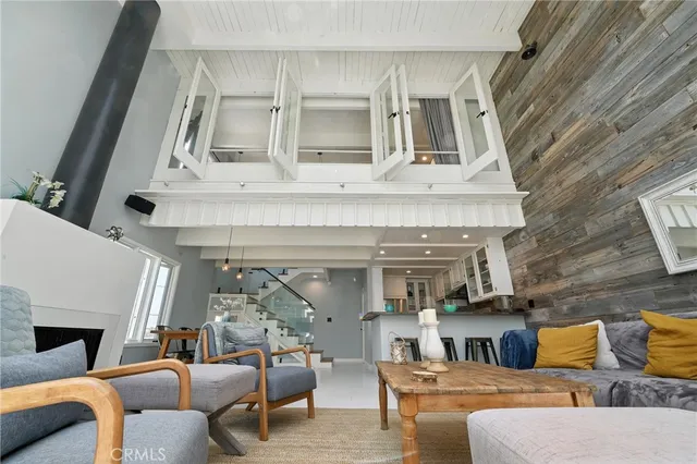 a view of staircase with white walls and a window