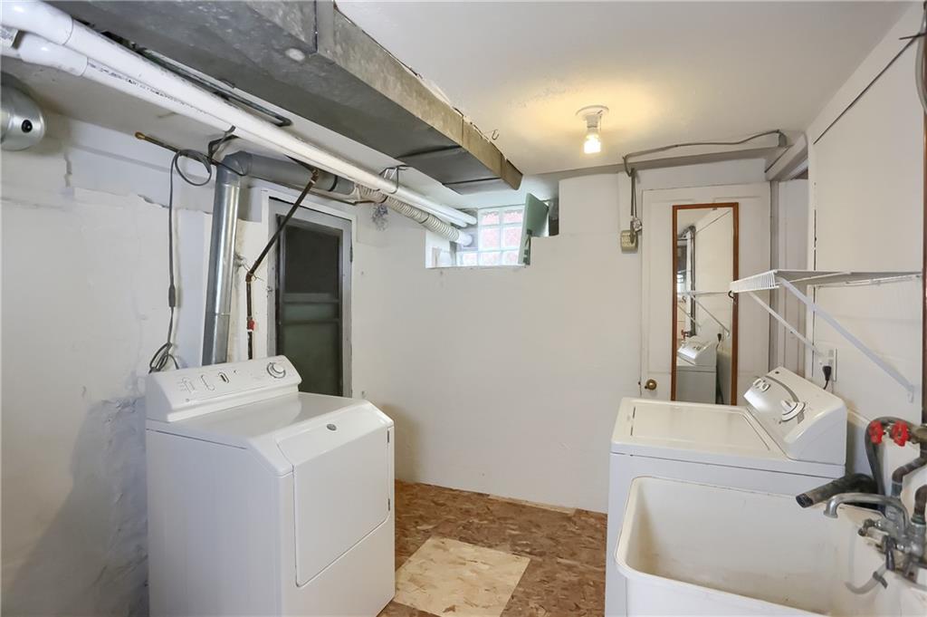 392 Reno Street Rochester, PA 15074 - Photo 28 of 41 a bathroom with a sink and a mirror