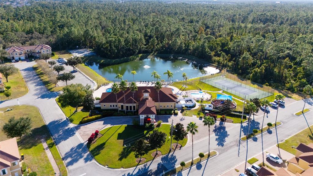 1736 Pacific Road Kissimmee, FL 34759 - Photo 26 of 42 an aerial view of a house with yard swimming pool and outdoor seating
