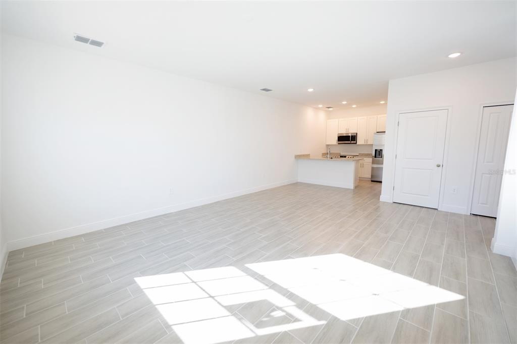 1736 Pacific Road Kissimmee, FL 34759 - Photo 29 of 42 a view of a kitchen with wooden floor