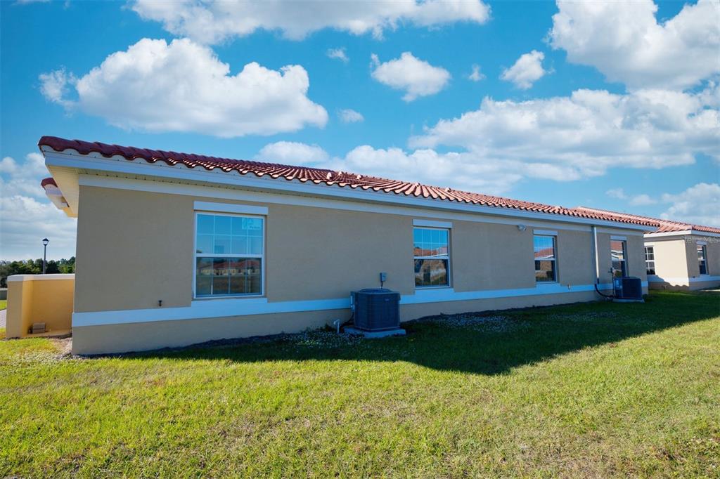 1736 Pacific Road Kissimmee, FL 34759 - Photo 38 of 42 a front view of house with yard and entertaining space