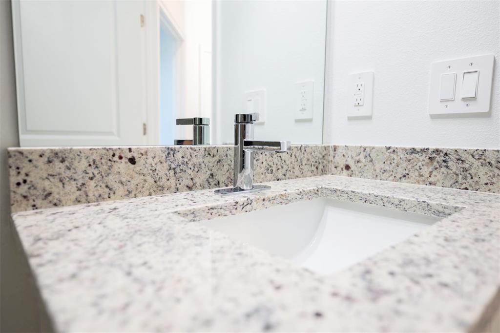 1736 Pacific Road Kissimmee, FL 34759 - Photo 41 of 42 a bathroom with bathtub and vanity