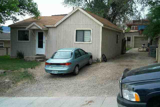 430 East 7th Street Rifle, CO 81650 - Photo 1 of 1 a front view of a house with a garden