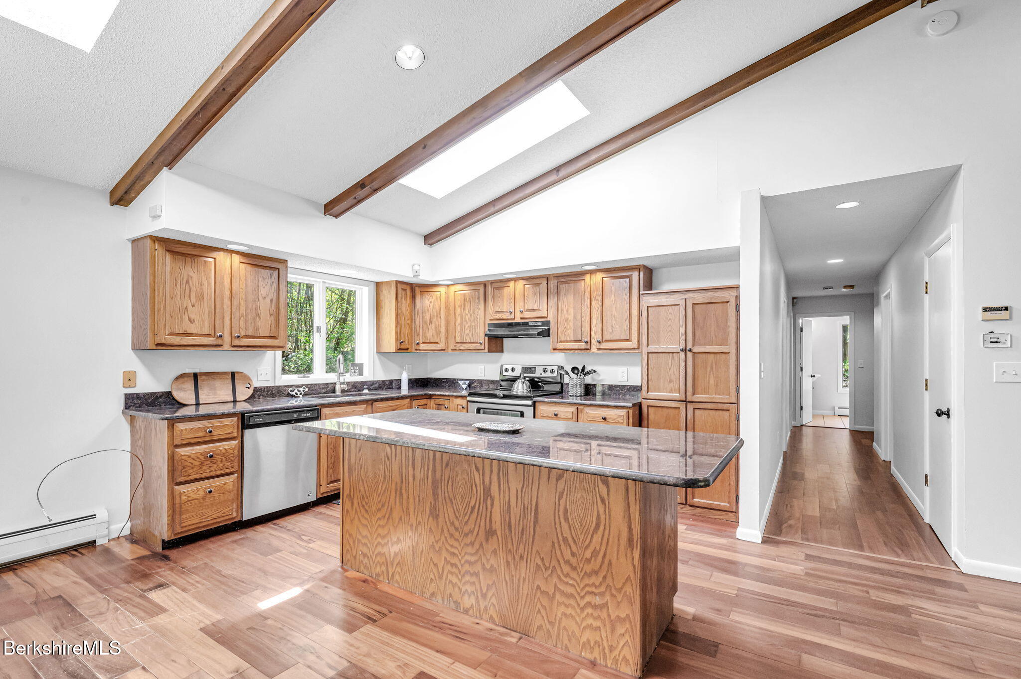 1874 Home Road Sheffield, MA 01230 - Photo 18 of 42 a large kitchen with kitchen island granite countertop lots of counter top space and stainless steel appliances