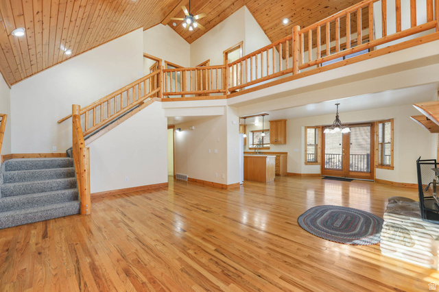 605 North Loafer Canyon Road Elk Ridge, UT 84651 - Photo 2 of 53 Front living area, view of vaulted wooden ceiling and dining/kitchen.