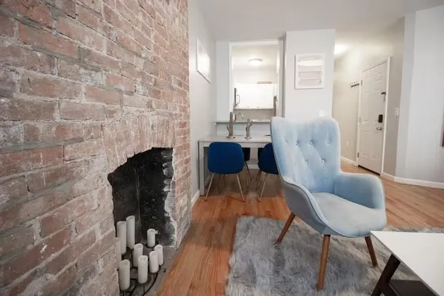 a view of livingroom with furniture and wooden floor