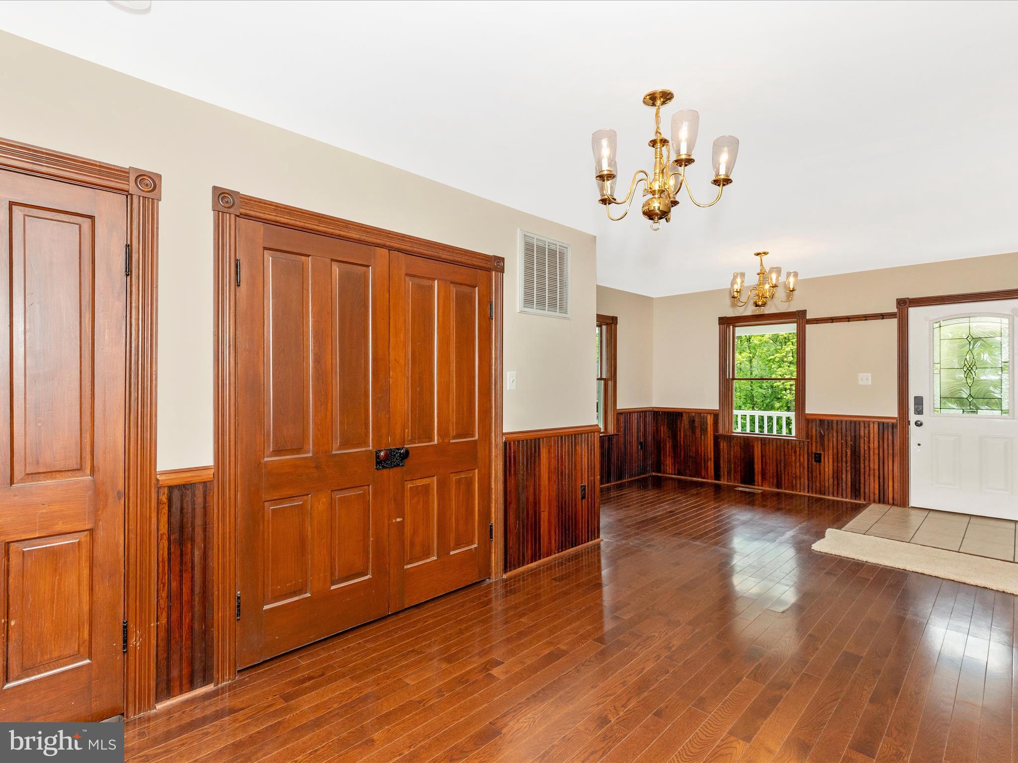 10433 Grindstone Run Road Myersville, MD 21773 - Photo 12 of 42 wooden floor in an empty room with a window