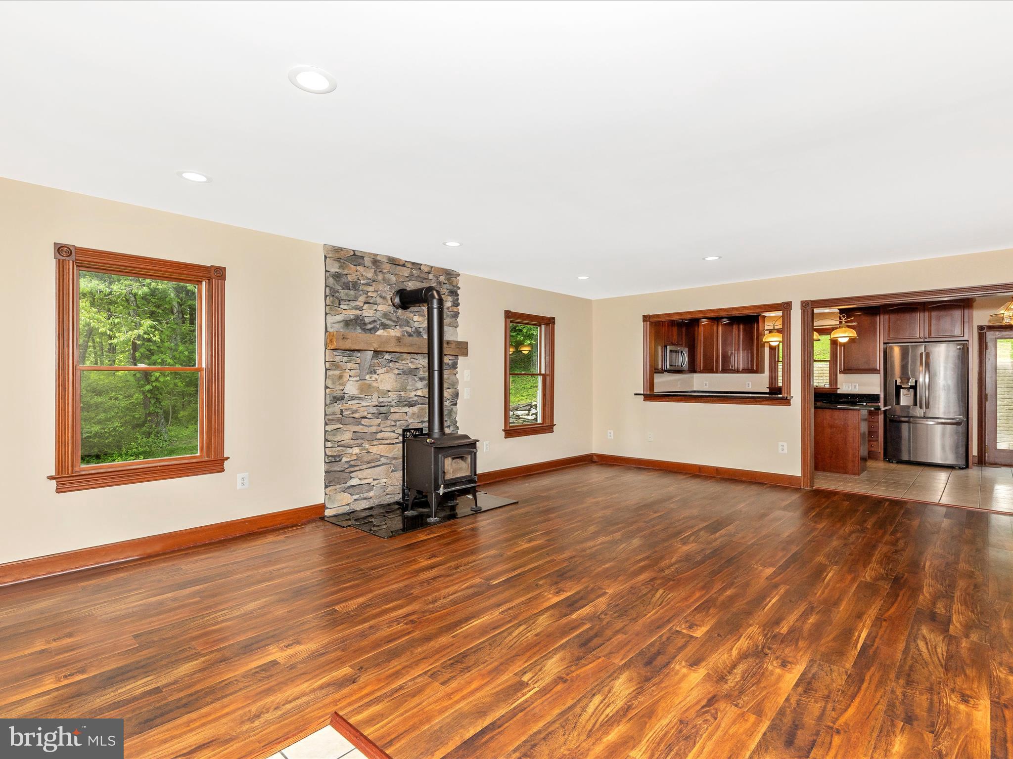 10433 Grindstone Run Road Myersville, MD 21773 - Photo 13 of 42 wooden floor in an empty room with a window