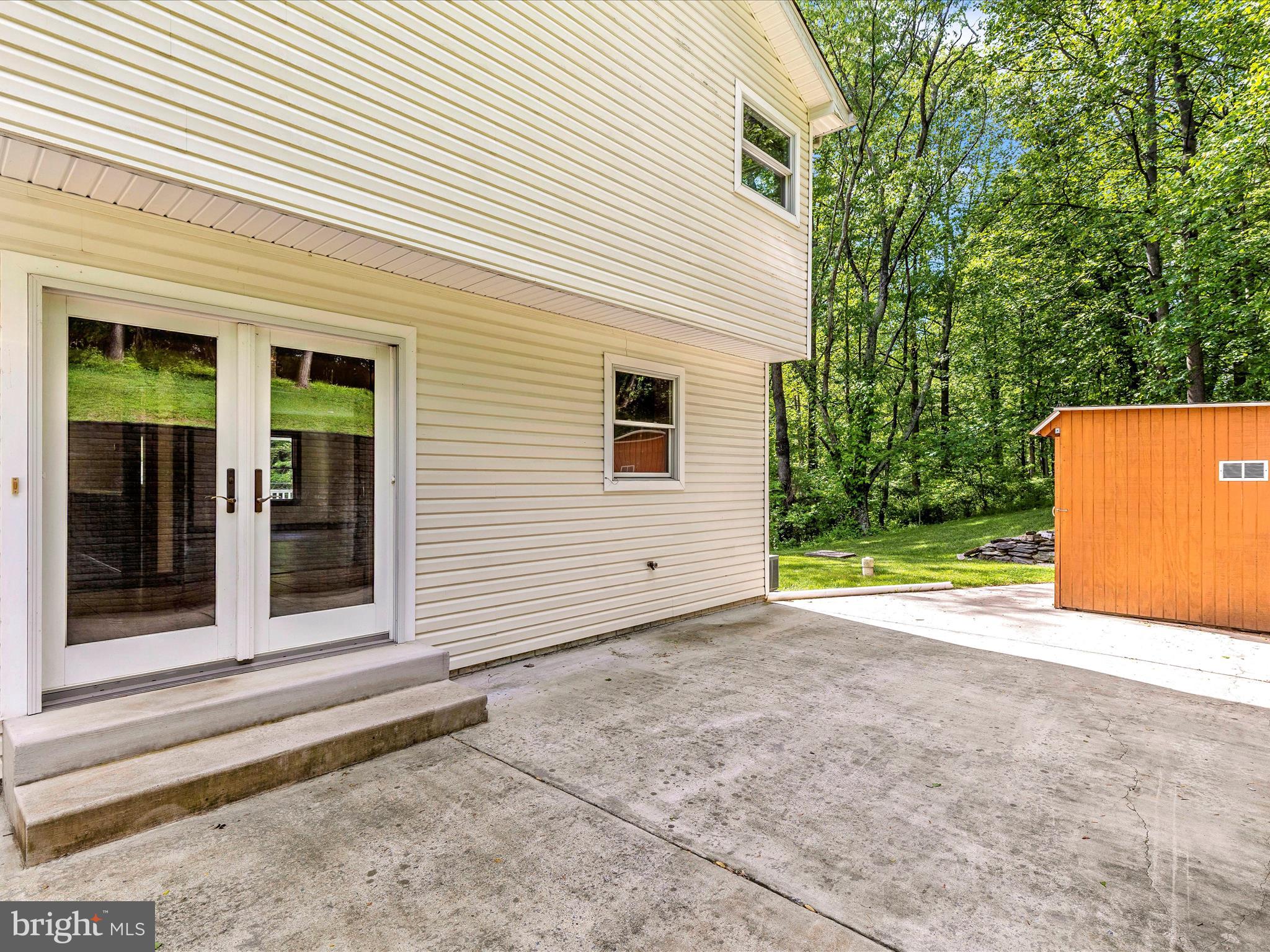 10433 Grindstone Run Road Myersville, MD 21773 - Photo 37 of 42 a view of a house with a backyard