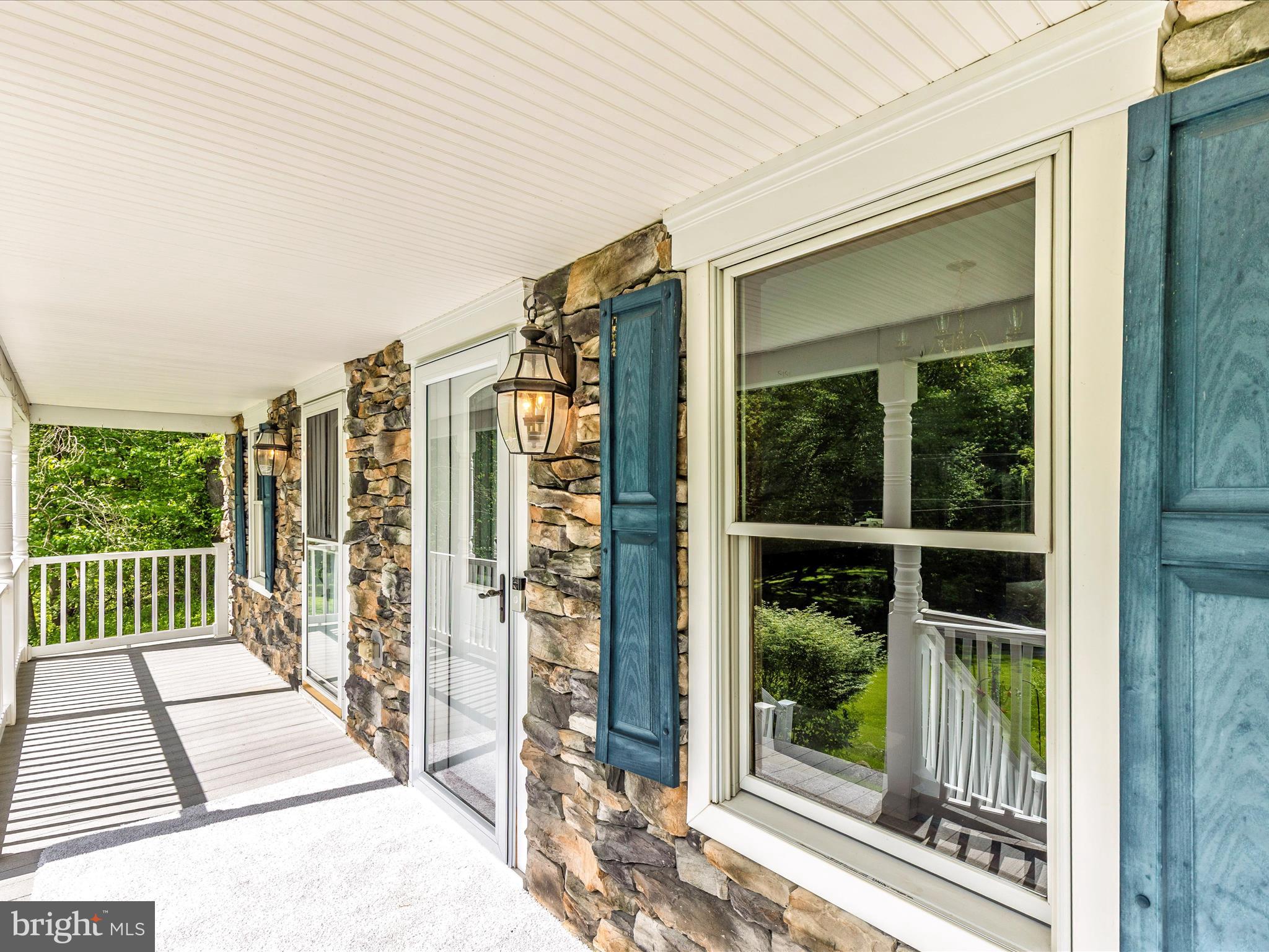 10433 Grindstone Run Road Myersville, MD 21773 - Photo 4 of 42 a view of a balcony with wooden floor