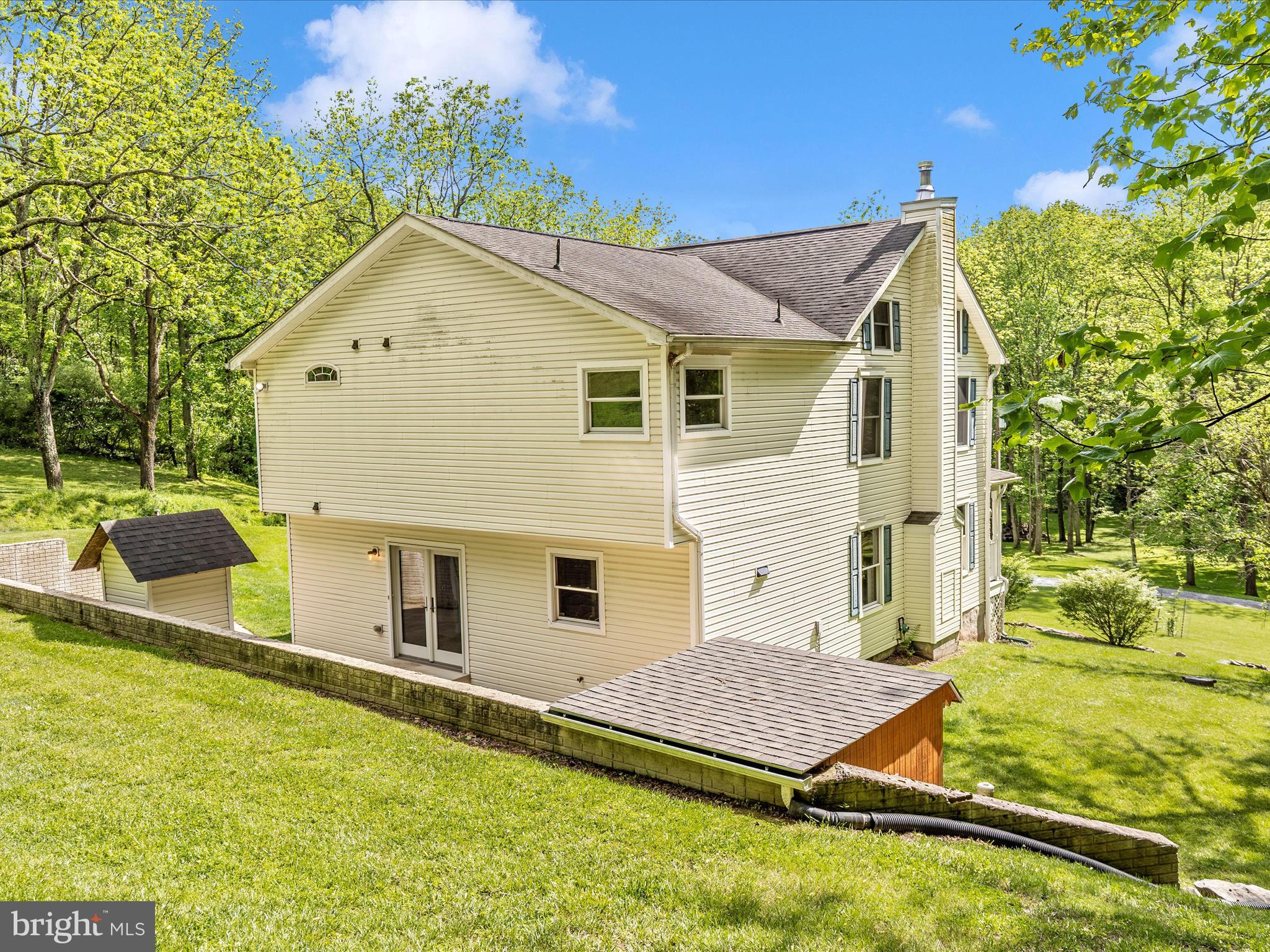 10433 Grindstone Run Road Myersville, MD 21773 - Photo 5 of 42 a view of a house with a backyard