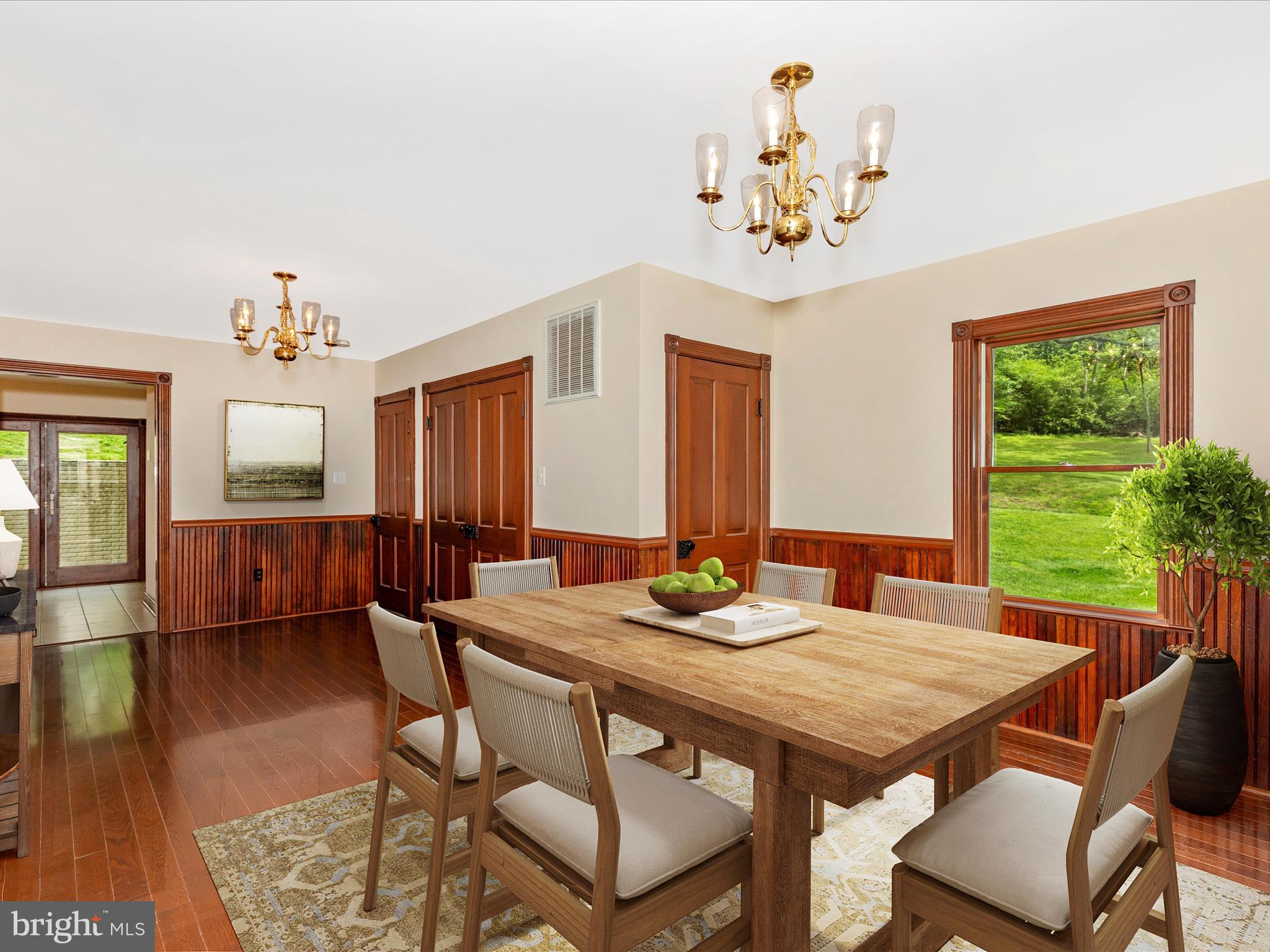 10433 Grindstone Run Road Myersville, MD 21773 - Photo 10 of 42 a view of a dining room with furniture window and wooden floor