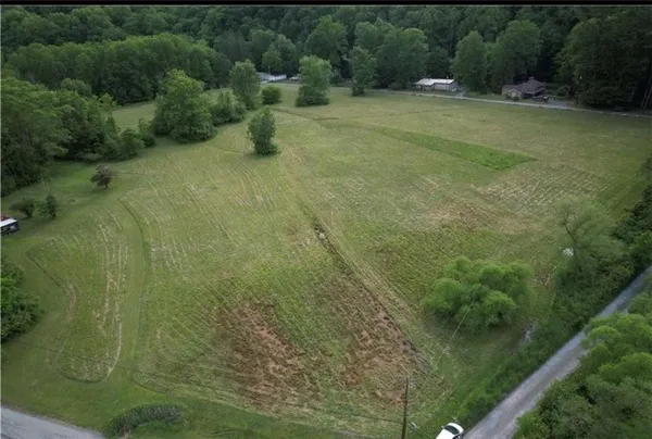 an aerial view of residential house with outdoor space