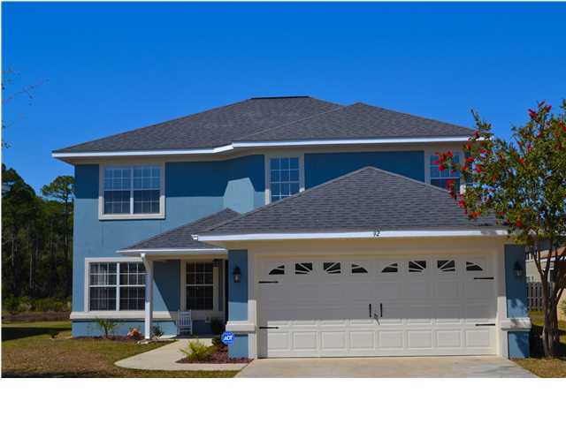 92 Red Bay Court Santa Rosa Beach, FL 32459 - Photo 1 of 19 a front view of a house with a yard