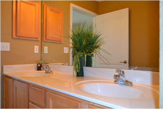 92 Red Bay Court Santa Rosa Beach, FL 32459 - Photo 13 of 19 a bathroom with a sink and a mirror