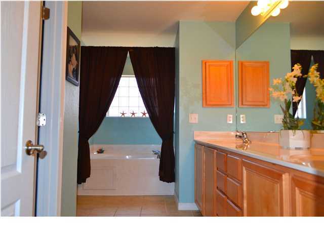 92 Red Bay Court Santa Rosa Beach, FL 32459 - Photo 14 of 19 a bathroom with a sink and a mirror