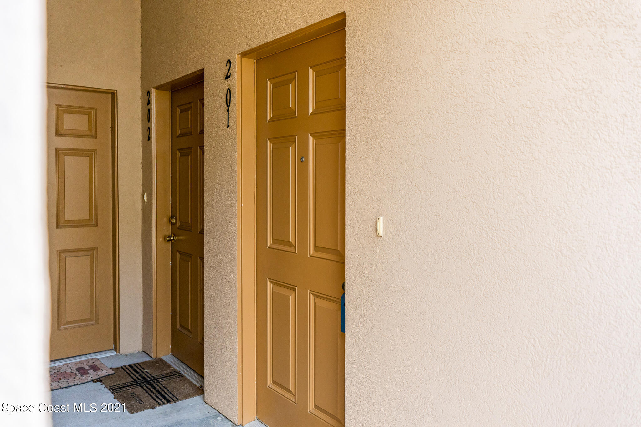 4056 Meander Place, Unit 201 Rockledge, FL 32955 - Photo 2 of 27 a view of elevator with a mirror