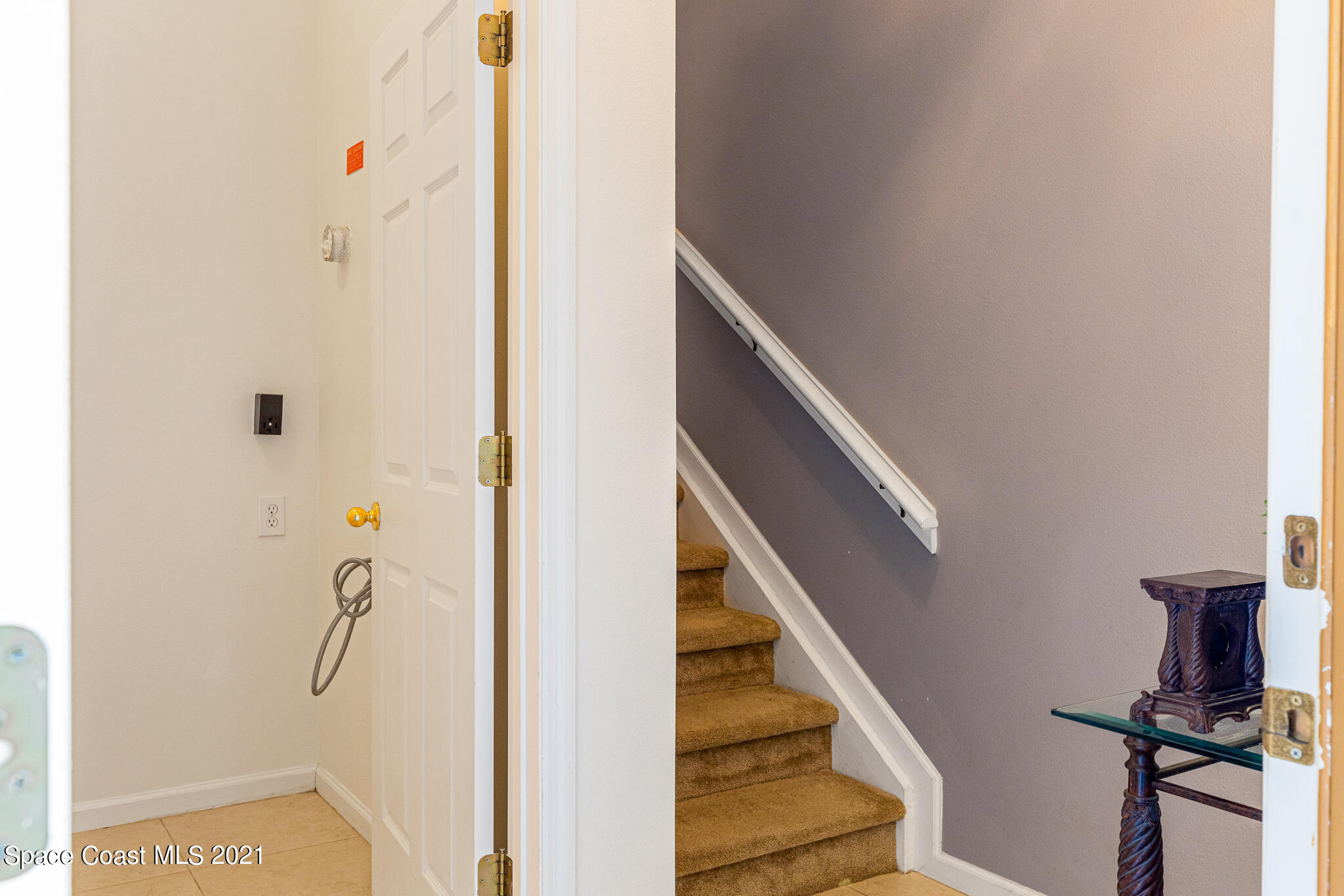 4056 Meander Place, Unit 201 Rockledge, FL 32955 - Photo 3 of 27 a view of an entryway with staircase